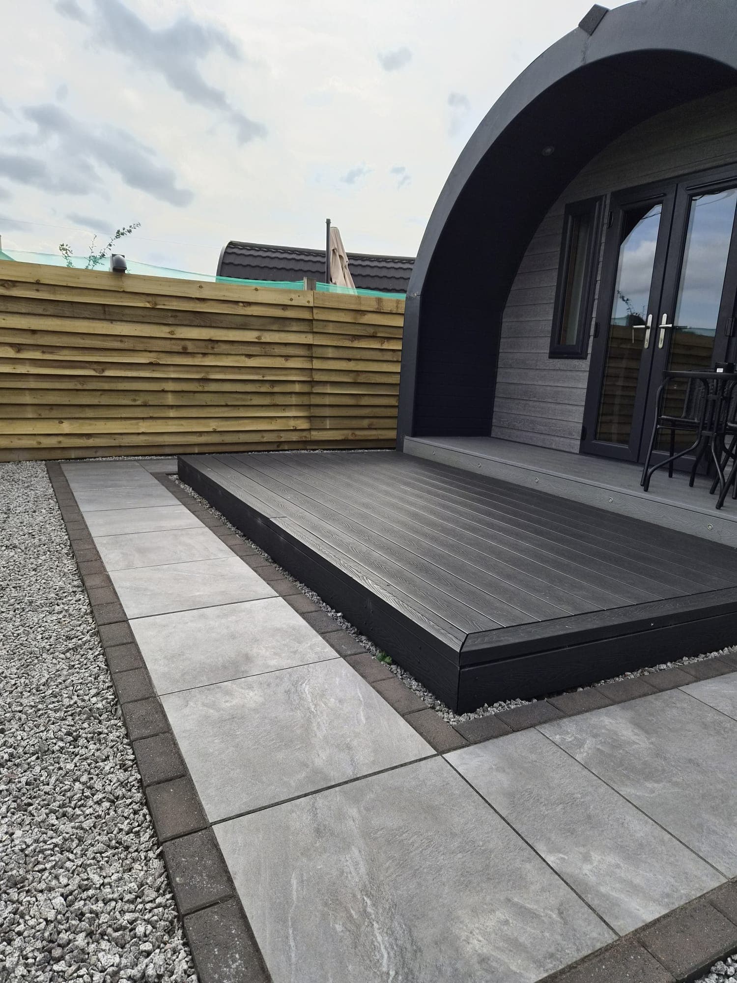 The Thistle Pod's composite decking and entrance
