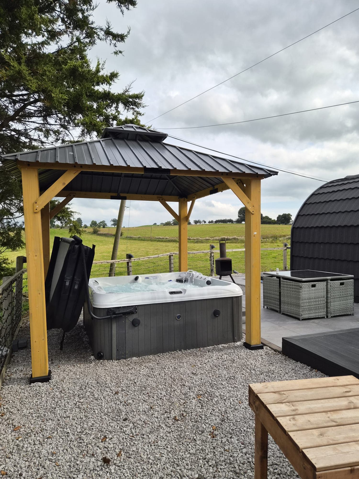 The Thistle Pod hot tub and gazebo, with the second pod behind